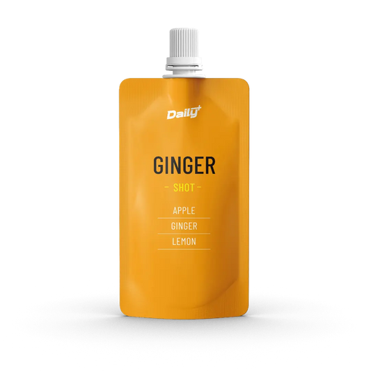 Orange packaging of a ginger shot with 'Dally' branding on a white background