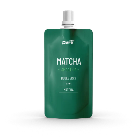 Green pouch of Daily Matcha Smoothie with blueberry, kiwi, and matcha flavors on a white background.
